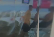 Imagens mostram homem sendo morto em frente a distribuidora