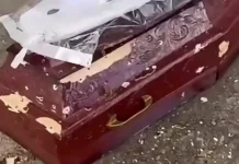 Homem invade enterro, metralha caixão e acaba morto pela PM